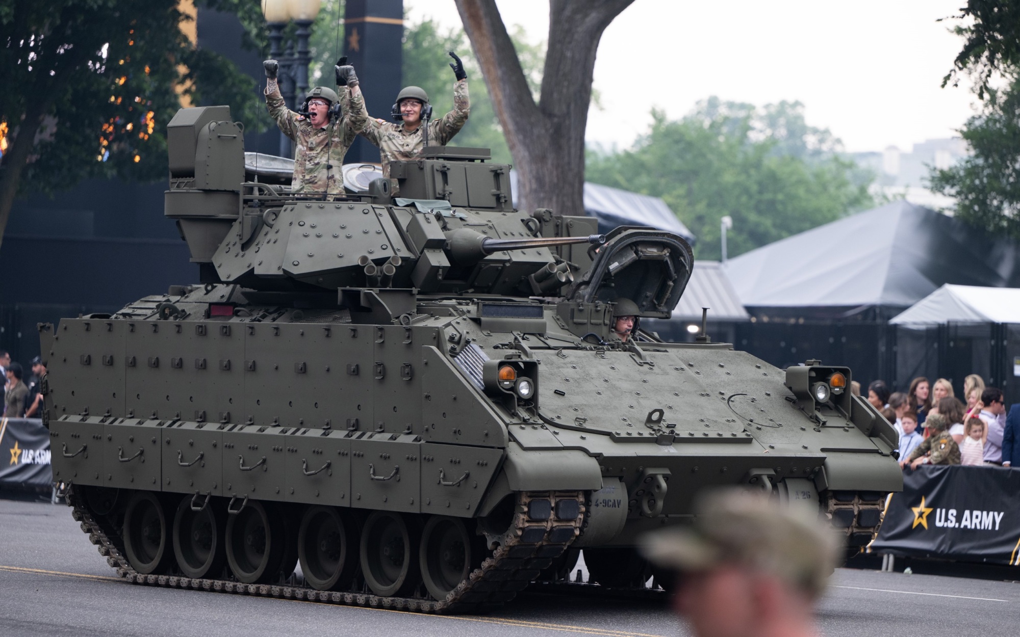 Soldiers in a Bradley Fighting Vehicle on parade