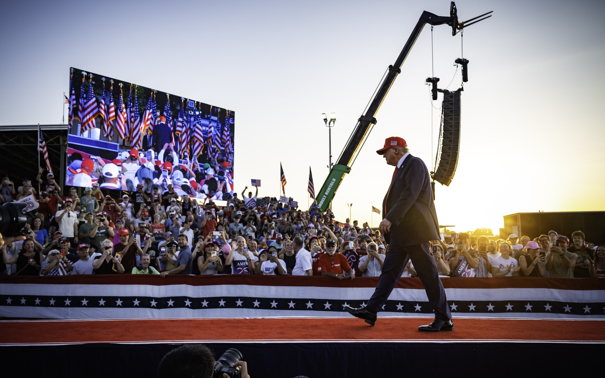 President Trump walking with crowd in the background at the America250 Iowa event on July 3 2025
