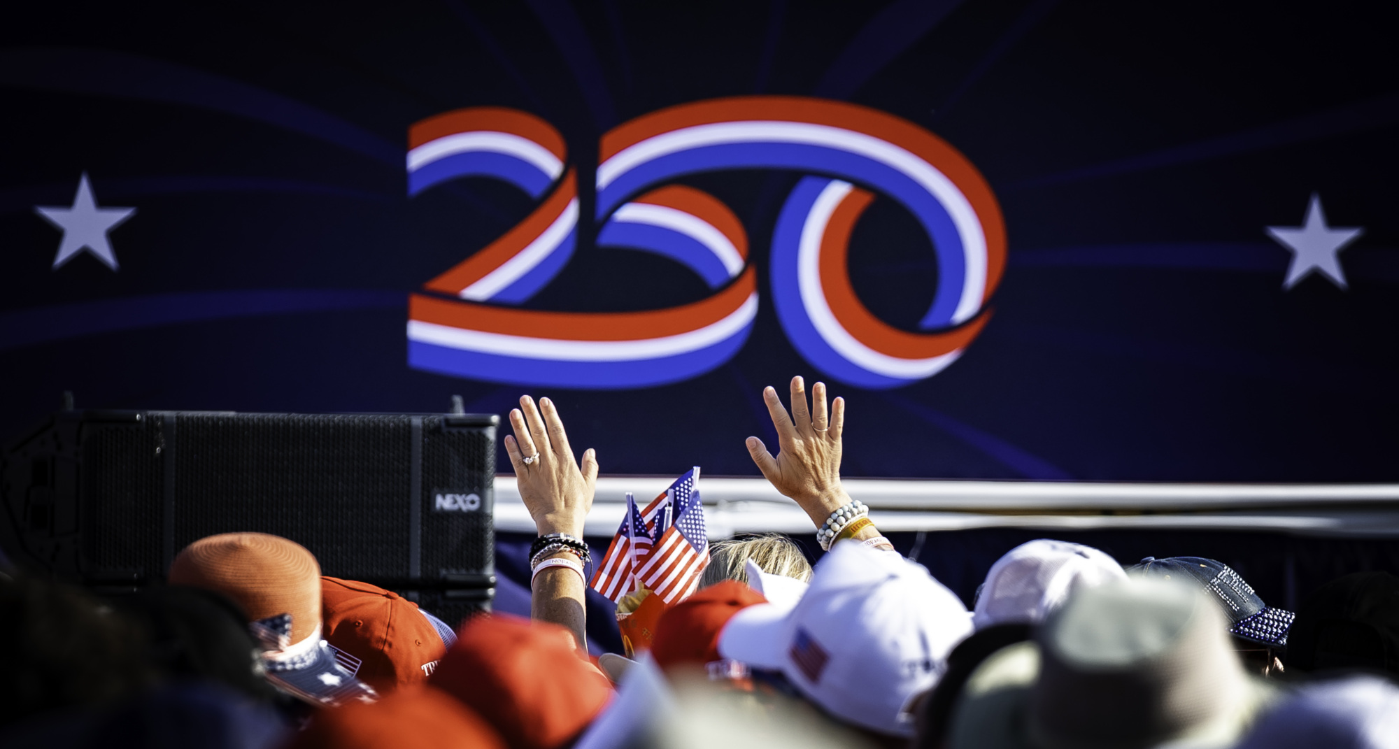 Hands in the air at the America250 Iowa event on July 3 2025